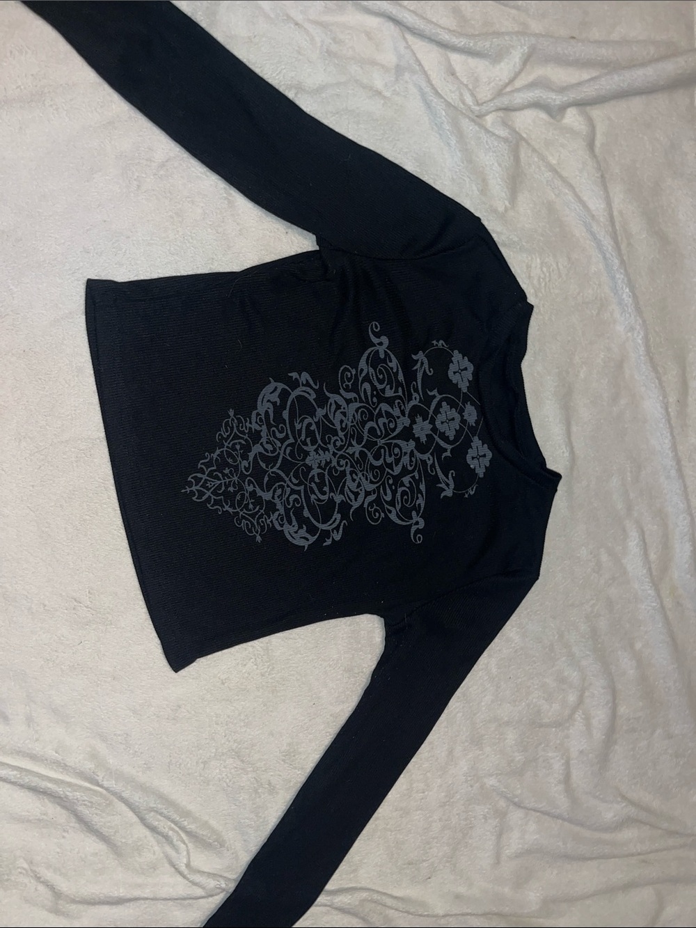 Black Long-Sleeve Women's Top with Decorative Print